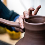 Doug Fitch and Hannah McAndrew making a jug for me